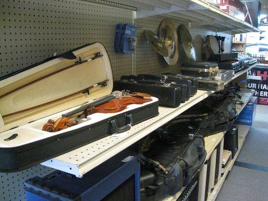 Musical instruments at Welsh Pawn Shop Rincon, GA 31326.