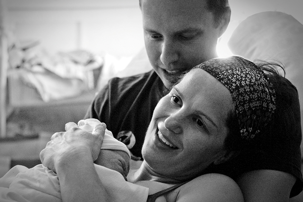 1 minute after birth, a new family meeting one another in loving bliss. A birth I attended as both a doula and photographer.