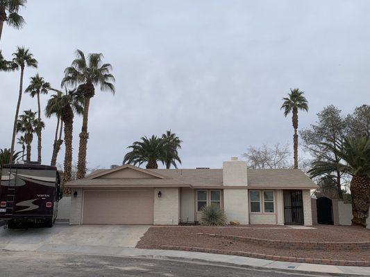 Coach lights on either side of garage door AND RV plugged into 50amp service on side of garage!