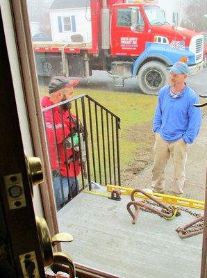 Right, Louis, co-owner.  Delivery of pre-cast stairs and installation of railings.