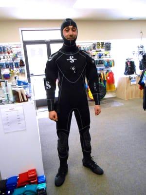 Kyle models his new Scubapro neoprene Drysuit, in our retail store. (Jan. 2014)