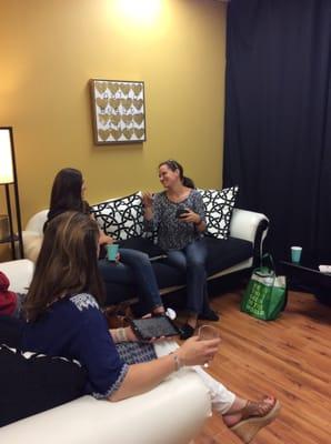 Moms enjoying time in our Social Oasis room