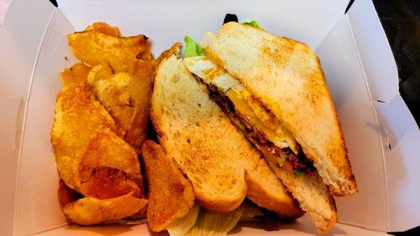 The Martha's Fav sandwich is delicious! Traditional BLT, avocado, chipotle aioli, topped with a fried egg, on grilled sourdough.