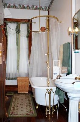 Full bath, featuring a 6 foot claw foot tub for soaking and relaxing.