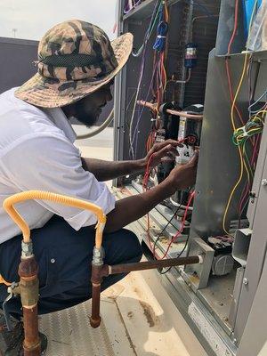 Rodney is working on troubleshooting an AC unit that is down.