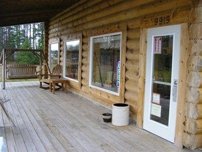 The front porch and door.. there are some seats and a swing out there now.