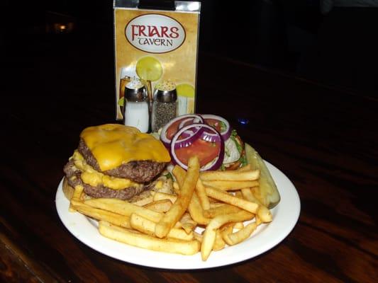 Friar's Pounder signature burger with a layer of mac&cheese sandwiched between two patties.