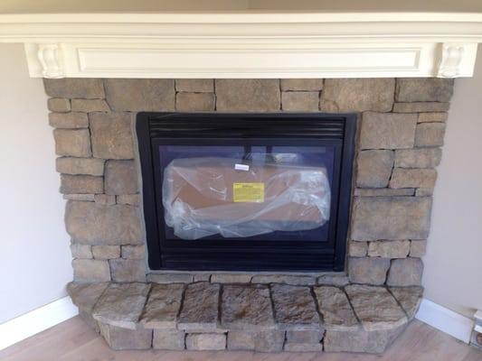 Cultured stone fireplace built in Scotchtown NY.  We installed this stone surround with very tight fits and a custom hearth.