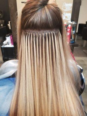 Links Hair Extensions, 18 inches long, Ultratress brand, this method the hair is reusable.