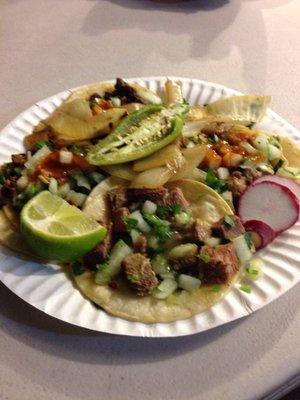 Asada, lengua, carnitas & tripas tacos. Delicious