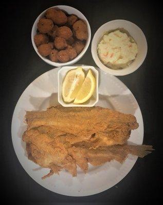 Two piece Whole Catfish served with a choice of two of our famous sides