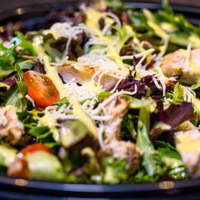 HARVEST SALAD
 A harvest lettuce blend, cherry tomatoes, topped with cheeses and cuts of delicious fire-grilled chicken breast.