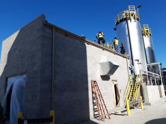 Doing Some Commercial Flat EPDM Roofing At The Owens Corning Plant.