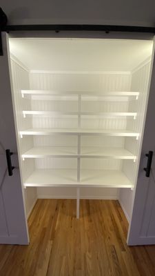 Custom pantry build.  Barn doors.  Motion detection LED lighting.  Bright.  Functional.  Beautiful.