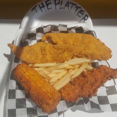 The Platter. 2 pieces of buttermilk fried catfish, 1 chicken tender, 1 deep fried corn cob