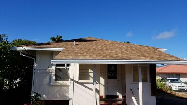 Old plantation style structure, but replaced the shingles and gutters. Fantastic job!