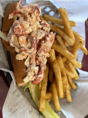 Our lobster roll is made with fresh lobster meat, lightly dressed with mayonnaise, served on a toasted hotdog bun.  Guaranteed to satisfy!!