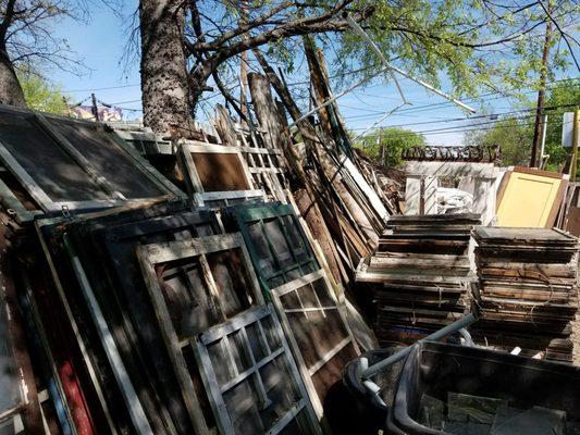 Vintage, salvaged and reusable windows and window screens from historical San antonio area... My imagination runs wild when I see these.