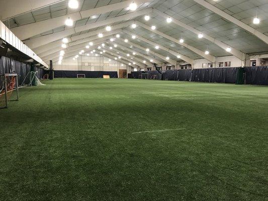 Indoor turf space at the Club Sport and Health and the shared home of All American Baseball Center.