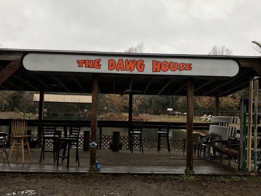 Enjoy the Dawg House, our outside bar and smoking area. Feed the fish and look out over the pond.