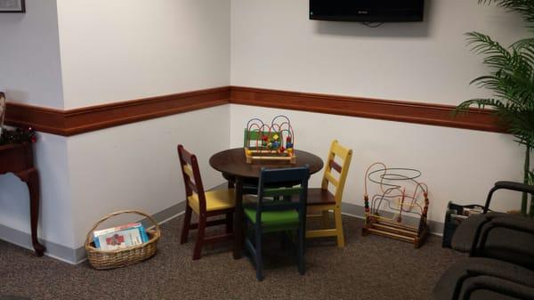 Bright, clean children's area in the reception room.