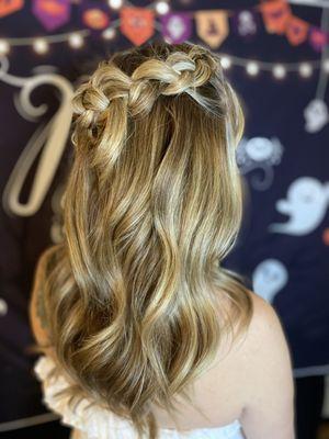 Special occasion style. Beach waves with loosely pinned dutch braid.