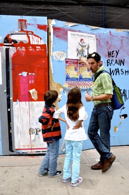 Giving a street art tour to a family of 4. (Mom and Dad not pictured.) The 12 and 8 year old loved it!