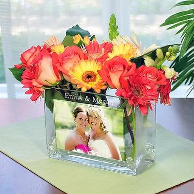 What a surprise when your loved one receives this flower arrangement. They can add a personal touch with a picture and names engraved.$36.99