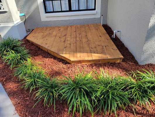 Small front garden deck and refreshed the landscape.