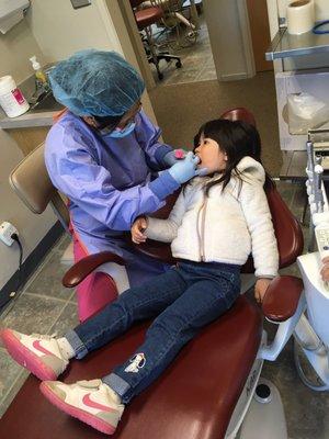 My daughter getting her regular dental check up