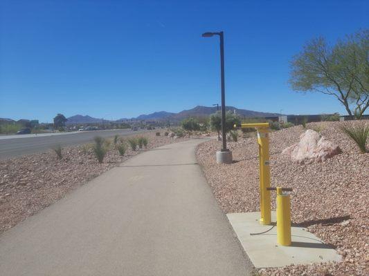 A bicycle station that includes an air pump. This is on the westbound side between Warm Springs and Sunset Roads.