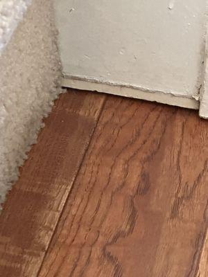 missed a piece of trim at the bottom of stairs all together