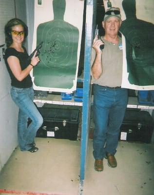 Father and daughter showing off their CHL shooting tests