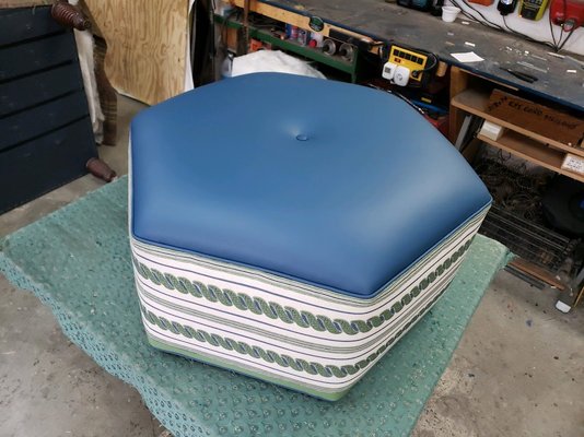 Custom made Ottoman, 6 sides top portion in leather with 1" button in the center fabric railroaded