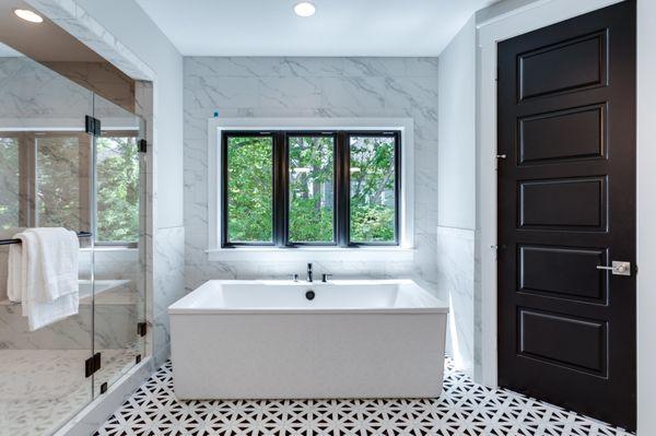 The freestanding tub in the owners bath is the perfect place to unwind after a long day