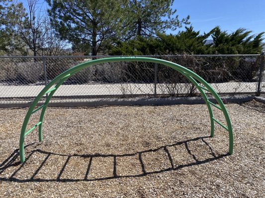 A piece of the playground to climb on.