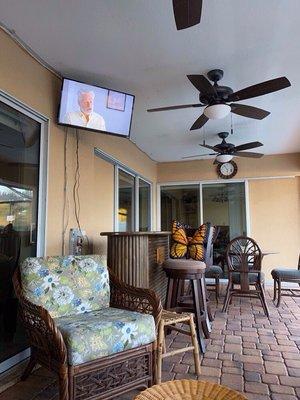 Swivel TV can be viewed from the sitting area or the dinning area of the Lanai.