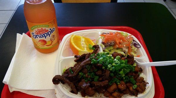 Plate of half and half on white rice