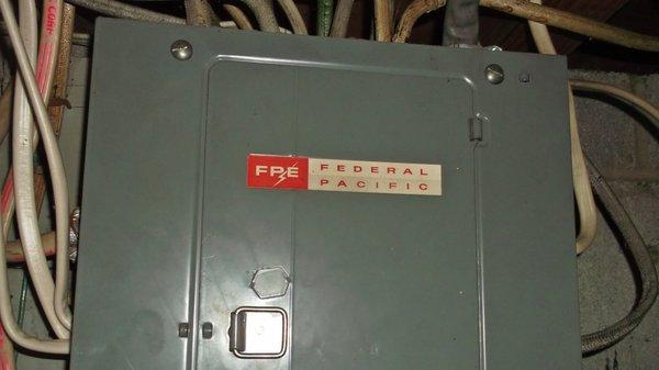 Federal Pacific Stab Lok main electrical panel.  Maybe worse than a Zinsco, for the same reason.