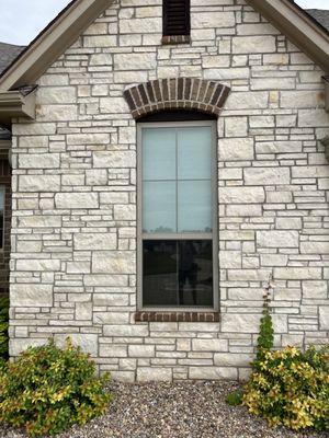 Stone before Stained and sealed shutters