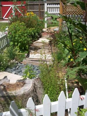 Green outdoor area at Sugar Mill Montessori School.