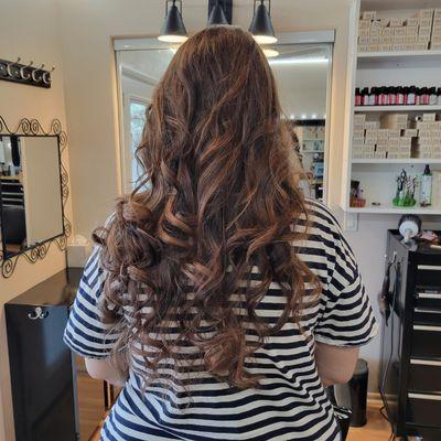 Beautiful long hair with Carmel Highlights