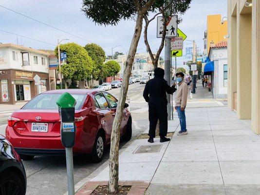 Paid armed guard to watch his Corolla