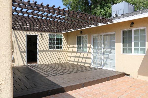 Wooden patio cover & deck + patio tile installation.  Van Nuys, March 2019 Photo and Work done By Total Construction and Remodeling, Inc.