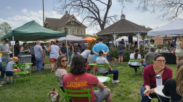 Visitors listening to live and local music at the Denton Community Market. Music is broadcast live on DentonRadio.com. Spring 2017