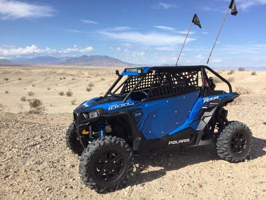 RZR - custom roll cage, door and roof panels, door bars, and enclosed light bar