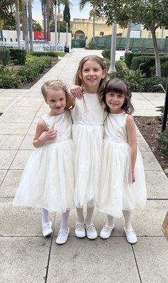 Three little granddaughters flower girls