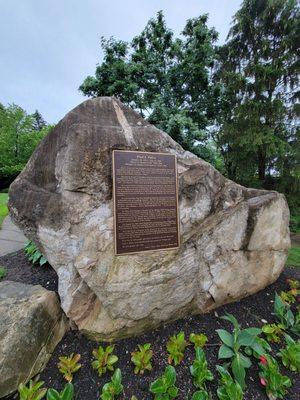 Rock with plaque about Paul J. Falco