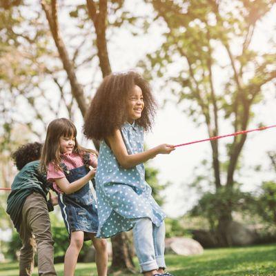 Kids Play Tug-O-War at the park