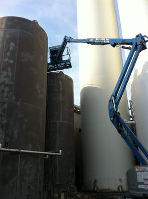 Sandblast and paint silos